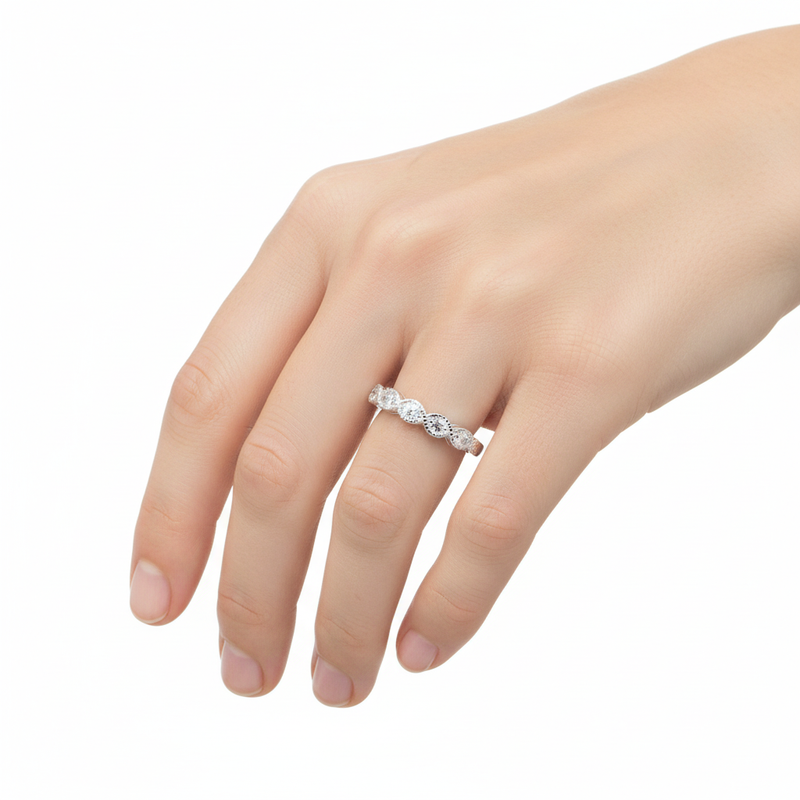 Sterling Silver and CZ Round Stone Ring On a Hand.