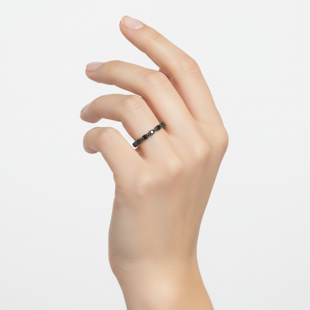 Sterling Silver Black CZ Oval Eternity Ring On a Hand.