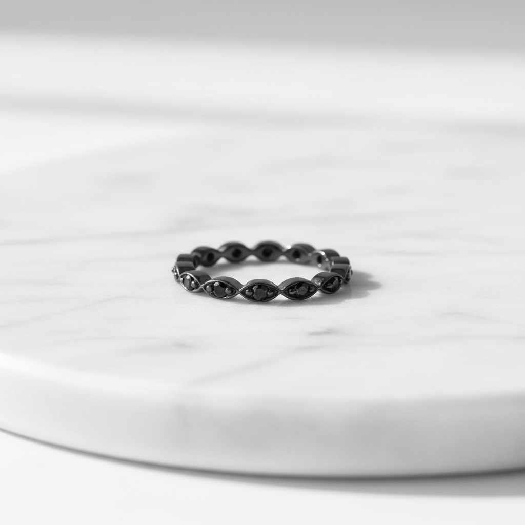 Sterling Silver Black CZ Oval Eternity Ring on White Table