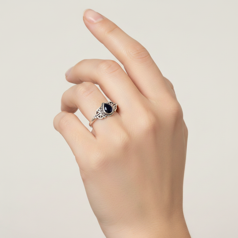 Sterling Silver Black Onyx Teardrop Ring on A Hand.