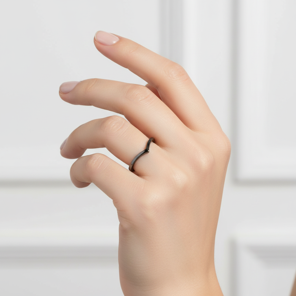 Sterling Silver Black Rhodium V Ring On A Hand.