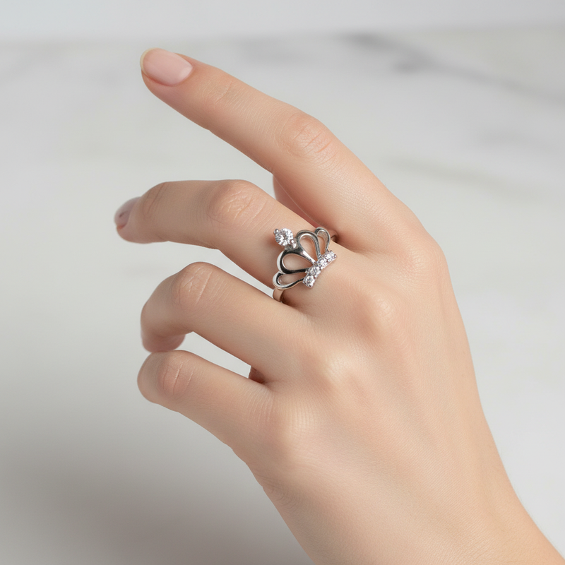 Sterling Silver Crown Ring On a Womans hand.