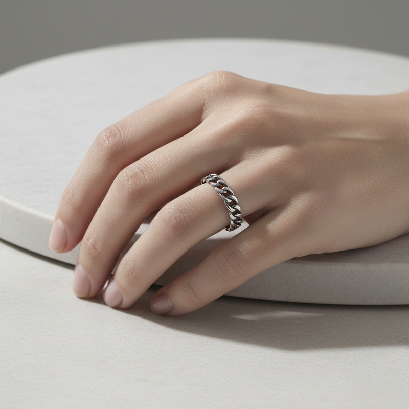 Sterling Silver Curb Chain Ring On A womans Hand.