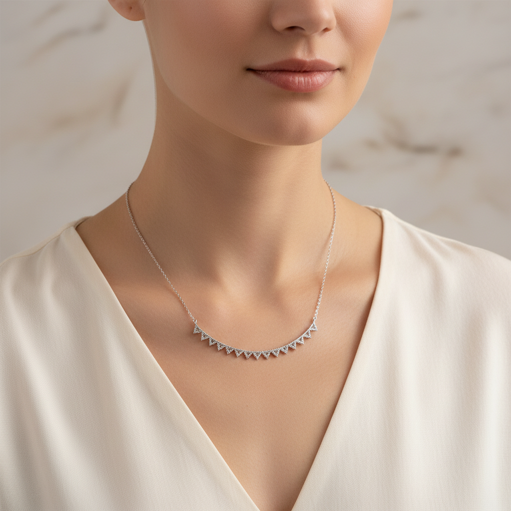 Sterling Silver Curved Bar Necklace On A Woman.