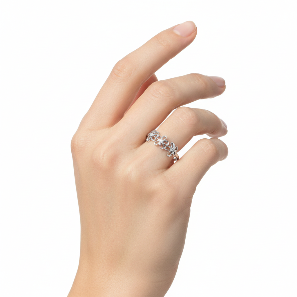 Sterling Silver CZ Flower Ring On A Hand.