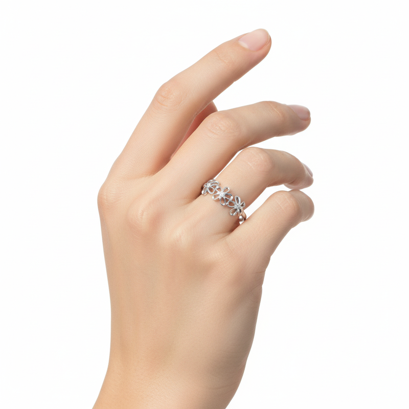 Sterling Silver CZ Flower Ring On A Hand.