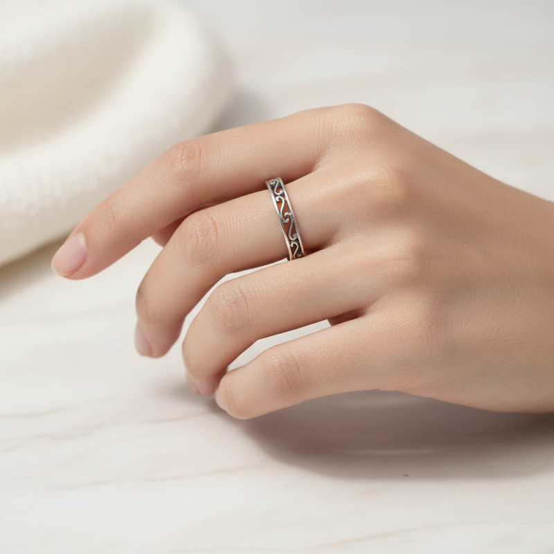 Sterling Silver Filigree Ring On a womans Hand.