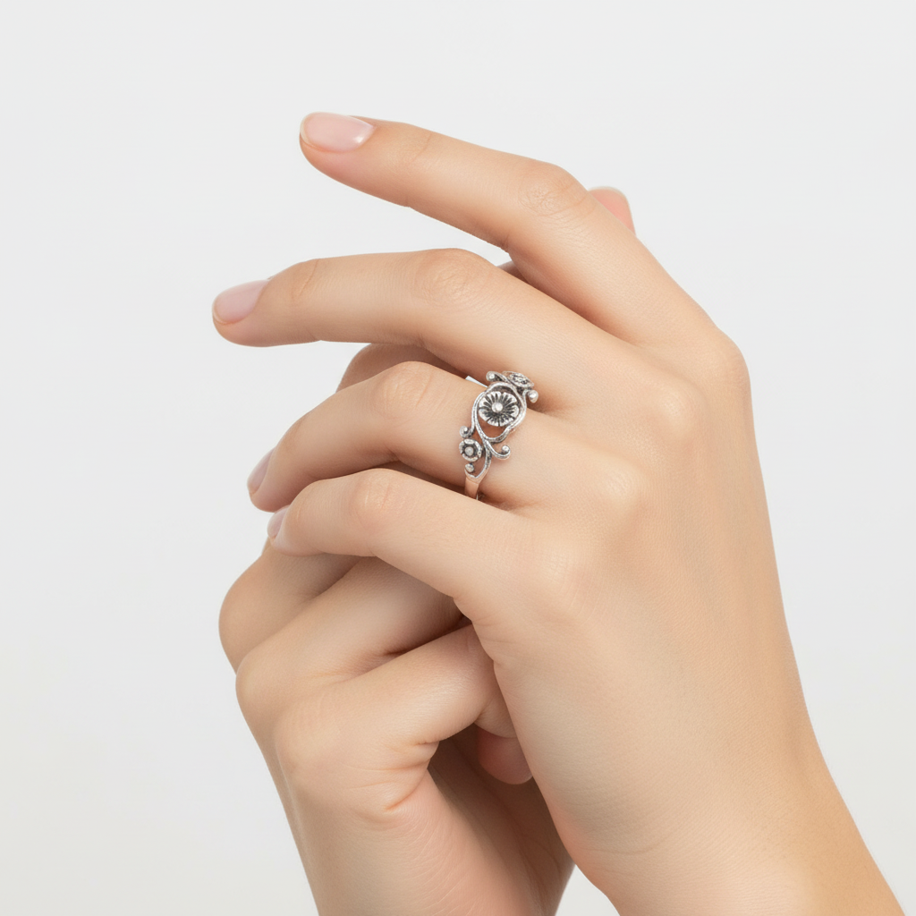 Sterling Silver Flower and Leaves Ring on a womans hand