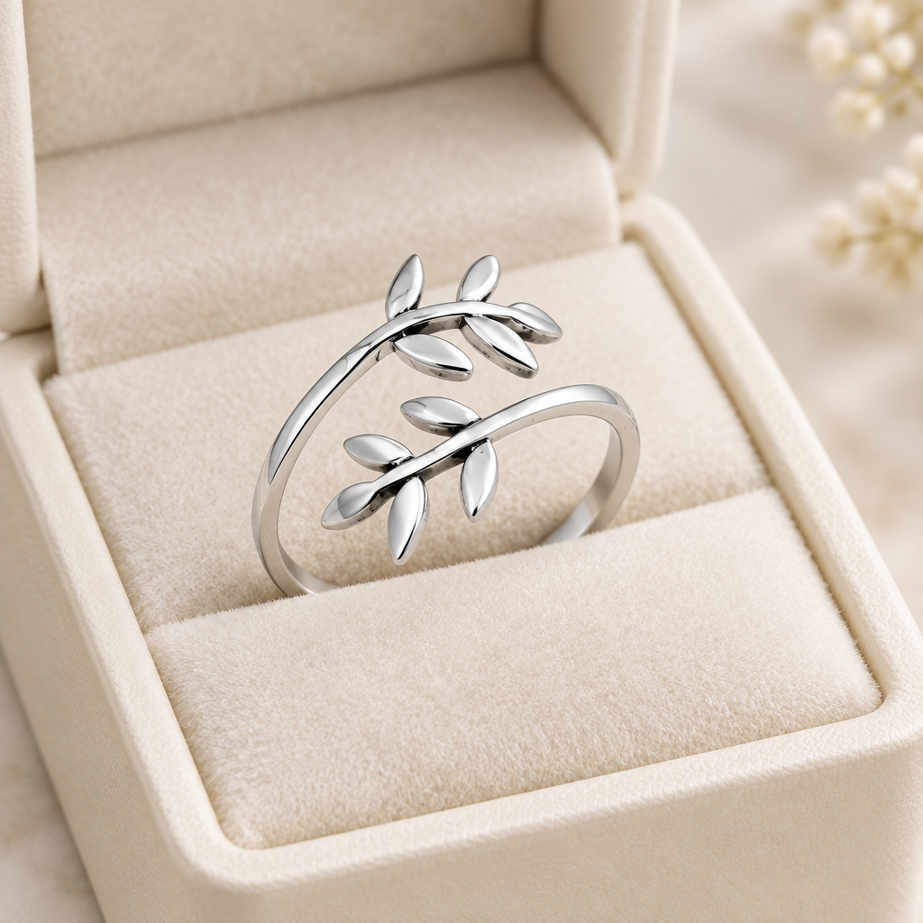 Sterling Silver Leaves on a Branch Ring in an ivory jewelry box