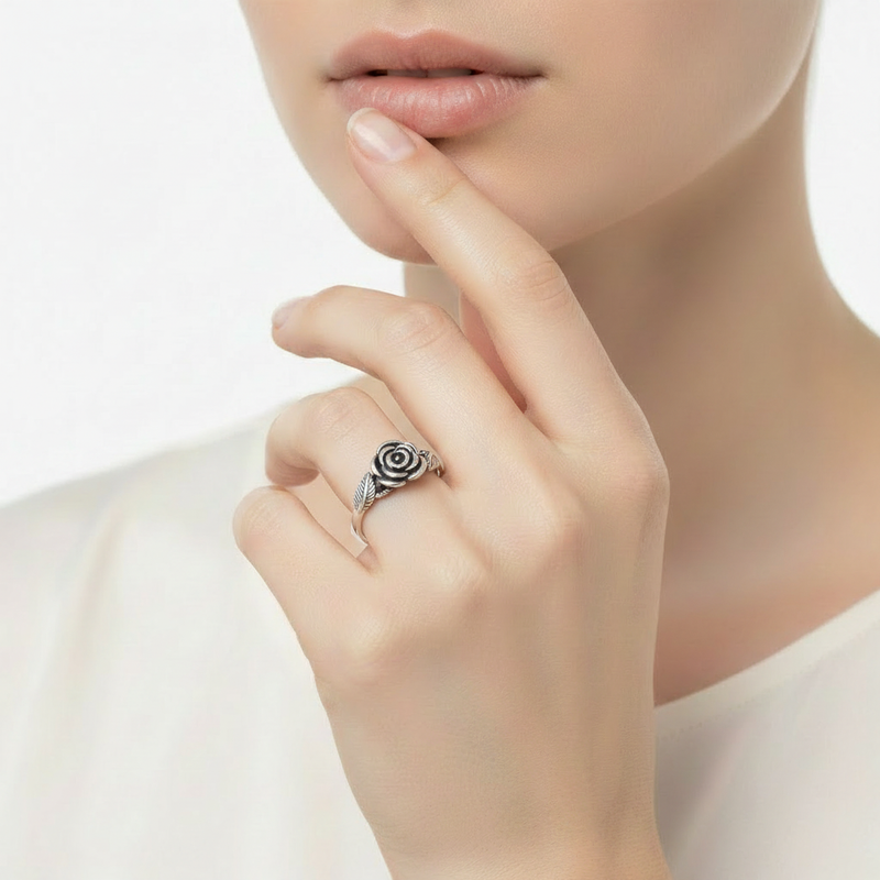 Sterling Silver Rose Flower Ring on a womans hand.
