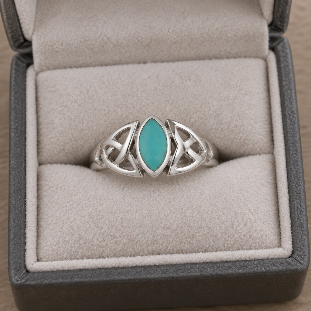 Turquoise Celtic sterling silver ring in a jewelry box