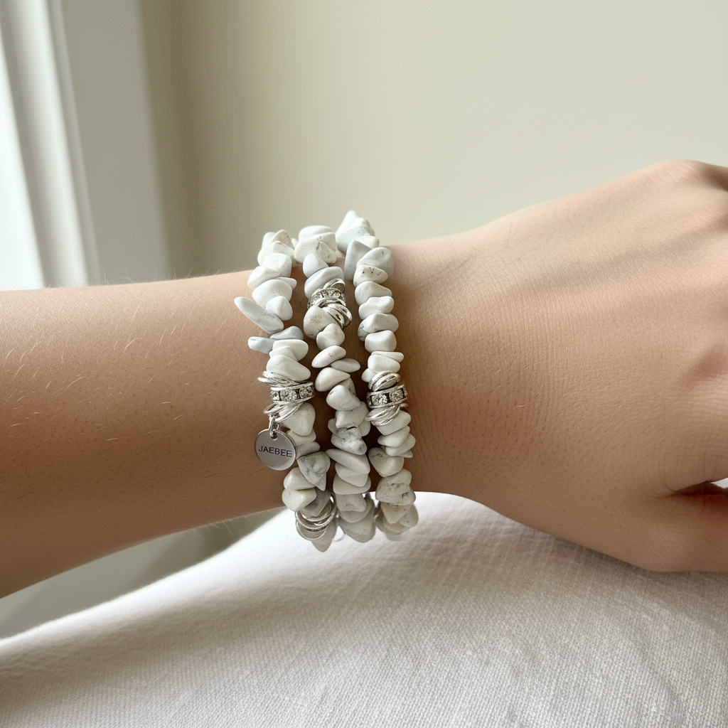White Howlite Chip Beaded Bracelet On A Hand