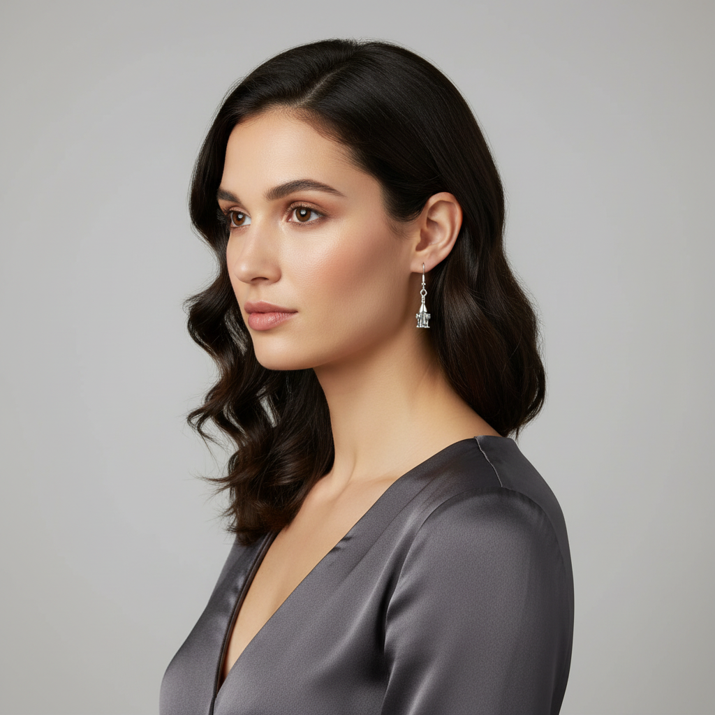 Wine bottle and glass earrings on model.