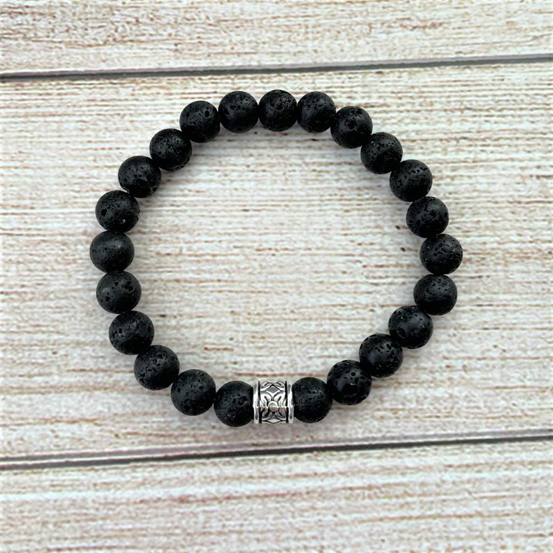 Black Lava Beaded Mens 8mm Stretch Bracelet with Silver Center Bead.